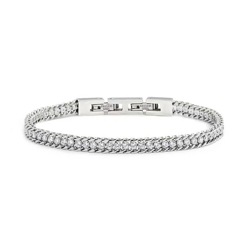 Bracelet style tennis en acier inoxydable avec ligne de strass blancs en oxydes de zirconium clairs et fermoir cliquet de sécurité.
