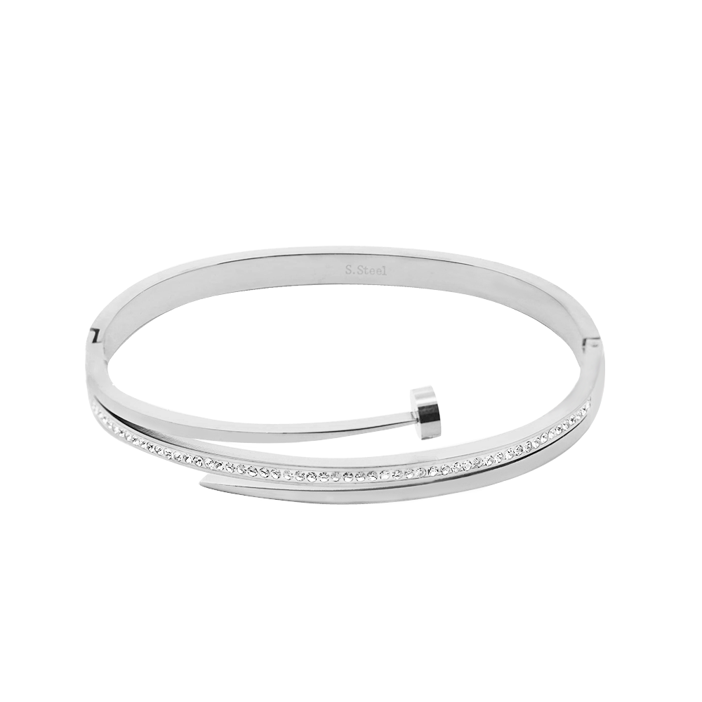 Bracelet rigide argenté de style minimaliste en forme de clou croisé, serti d'oxydes de zirconium clairs étincelants.