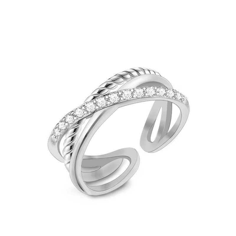 Bague ouverte ajustable croisée et torsadée en acier inoxydable argenté pavée de strass REF 269.