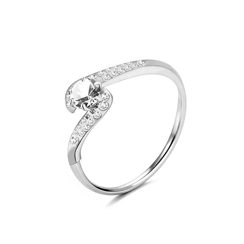 Bague solitaire enlacé en acier inoxydable argenté pavée de strass scintillants REF 280.