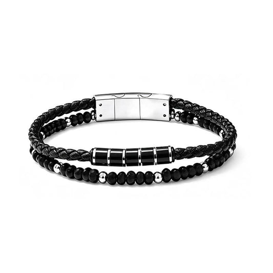 Bracelet double rang pour homme composé d'une lanière en cuir noir tressé avec cinq cylindres centraux noirs et argentés, et d'un rang de petites perles noires facettées et argentées, avec fermoir magnétique en acier.