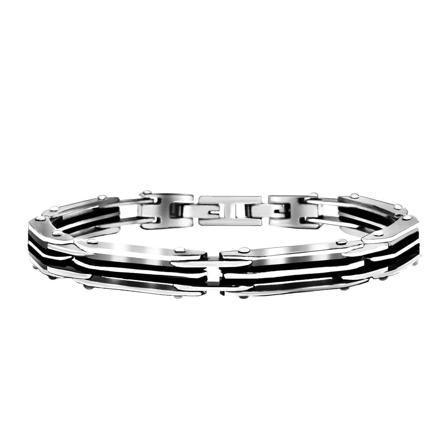 Bracelet pour homme en acier inoxydable argenté poli avec maillons articulés ajourés en double rail noir, de style industriel et mécanique avec fermoir à cliquet central.