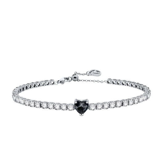 Bracelet style tennis rivière en acier inoxydable argenté composé de cristaux blancs étincelants et d'une pierre centrale en forme de cœur noir.