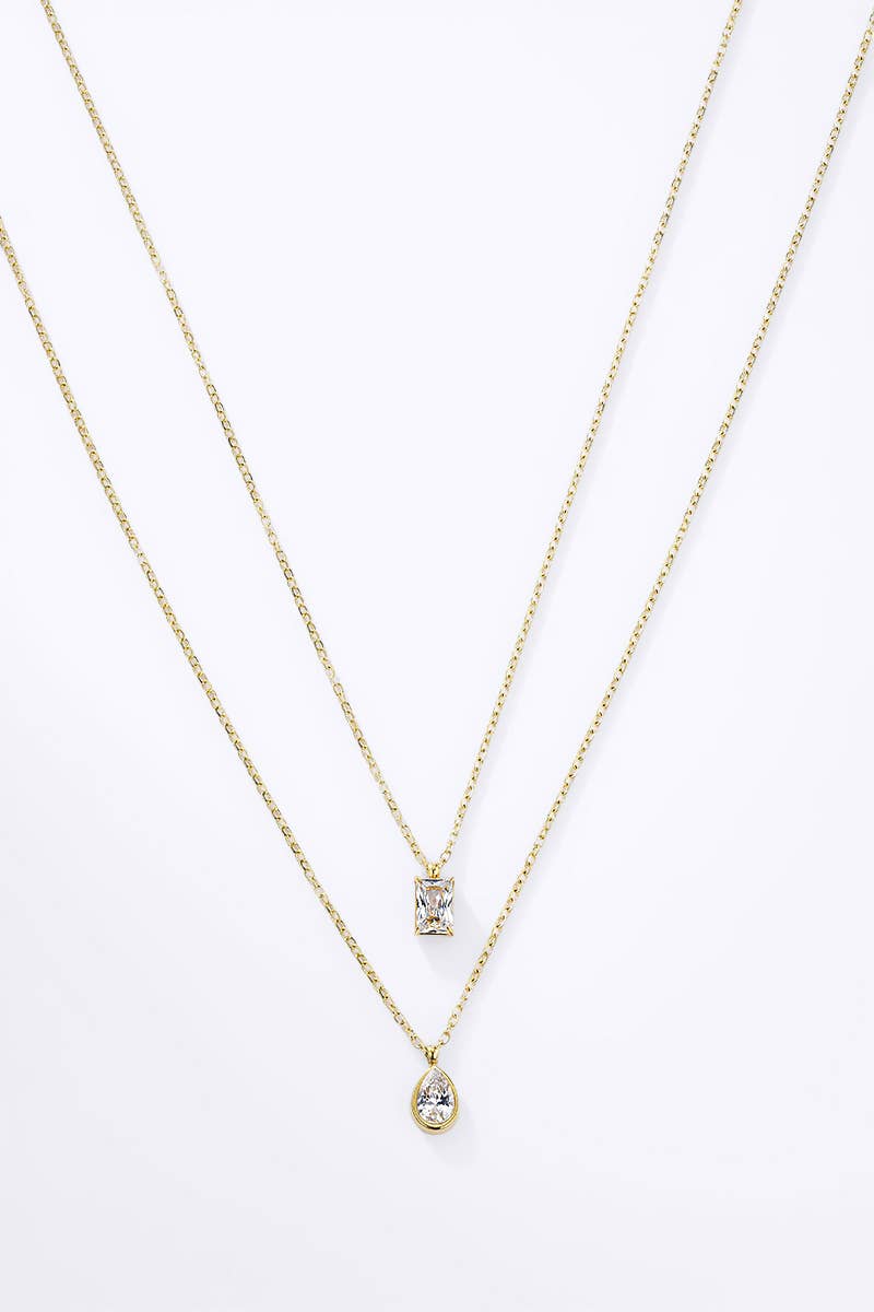 Collier double rang doré pour femme en acier inoxydable avec pendentif rectangle et pendentif goutte en cristal blanc brillant.