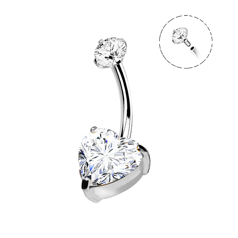 Piercing de nombril argenté incurvé orné d'un grand cristal blanc en forme de cœur à sa base et d'un strass rond au sommet, avec un schéma explicatif en médaillon montrant le pas de vis interne.