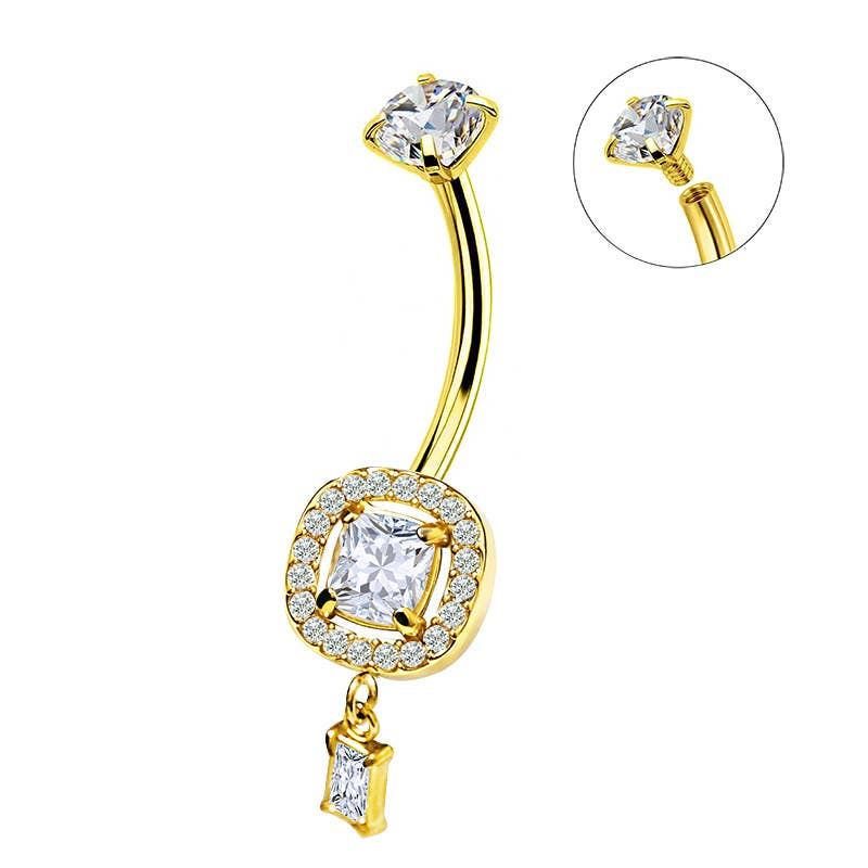 Piercing de nombril doré avec pendentif cristal rectangulaire mobile et gros oxyde de zirconium central entouré de strass clairs.