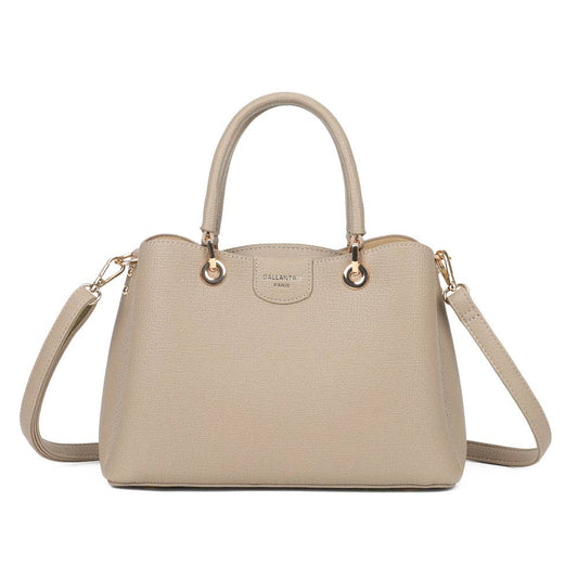 Sac à main Le Galant en similicuir taupe avec œillets dorés et bandoulière REF 297.