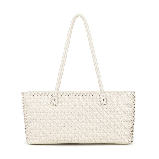 Sac à main cabas tressé Bréva REF 122 couleur blanc crème avec de longues anses épaule tubulaires.