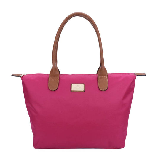 Sac shopping grand format La Balade en nylon rose fuchsia foncé éclatant (REF 19), présentant ses anses contrastantes marron camel et sa fermeture zippée supérieure, isolé sur fond blanc.