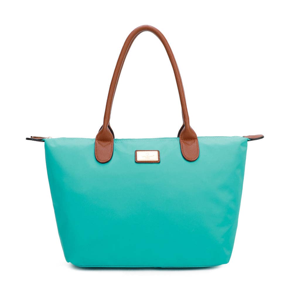 Sac cabas en nylon vert émeraude vif La Balade (REF 22), mettant en valeur le contraste avec ses anses rigides en similicuir camel et son écusson métallique doré, isolé sur fond blanc.